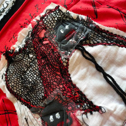 Face No.001 | Un-knitted Yarn thingamajig – Oversized Black Sleeveless Top