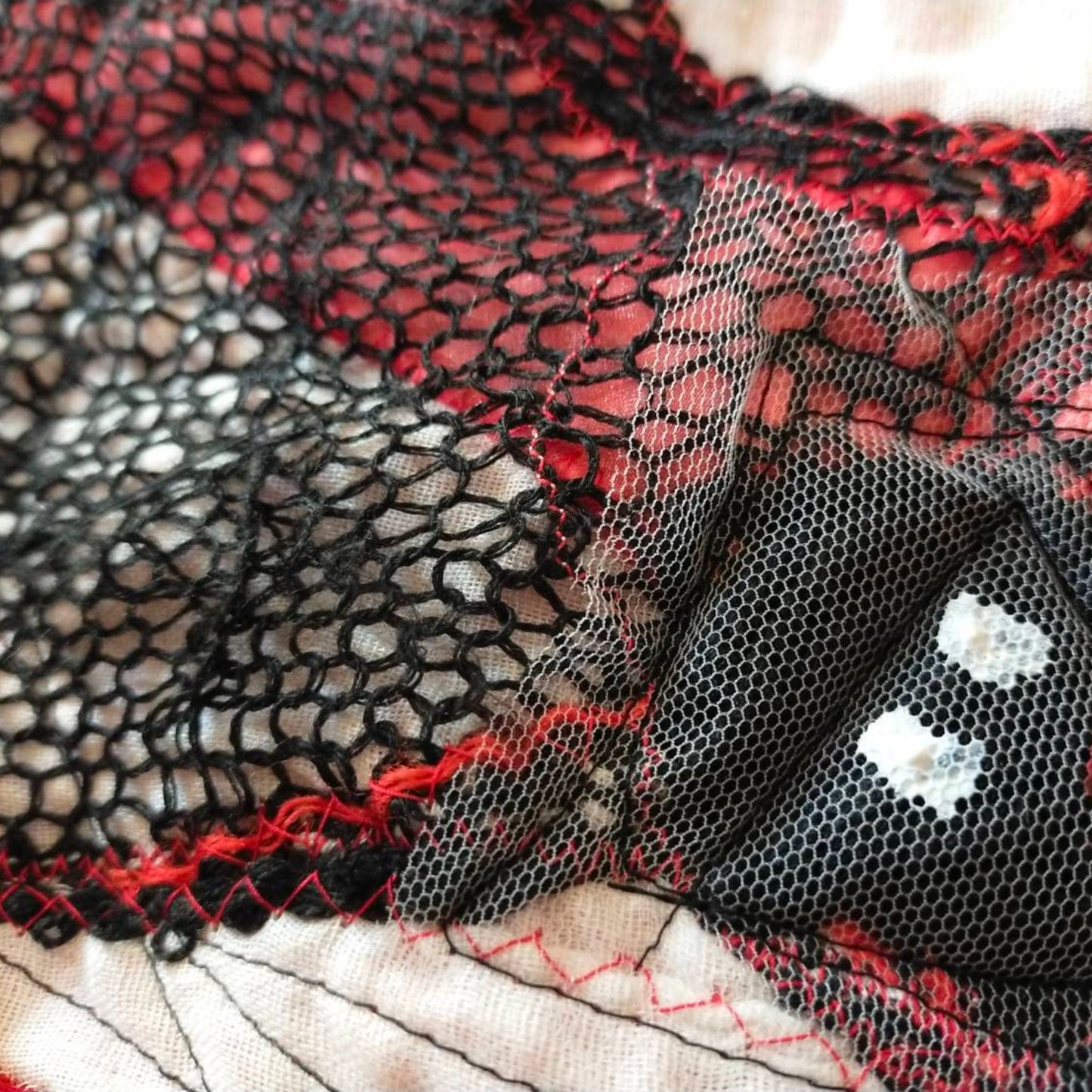 Face No.001 | Un-knitted Yarn thingamajig – Oversized Black Sleeveless Top