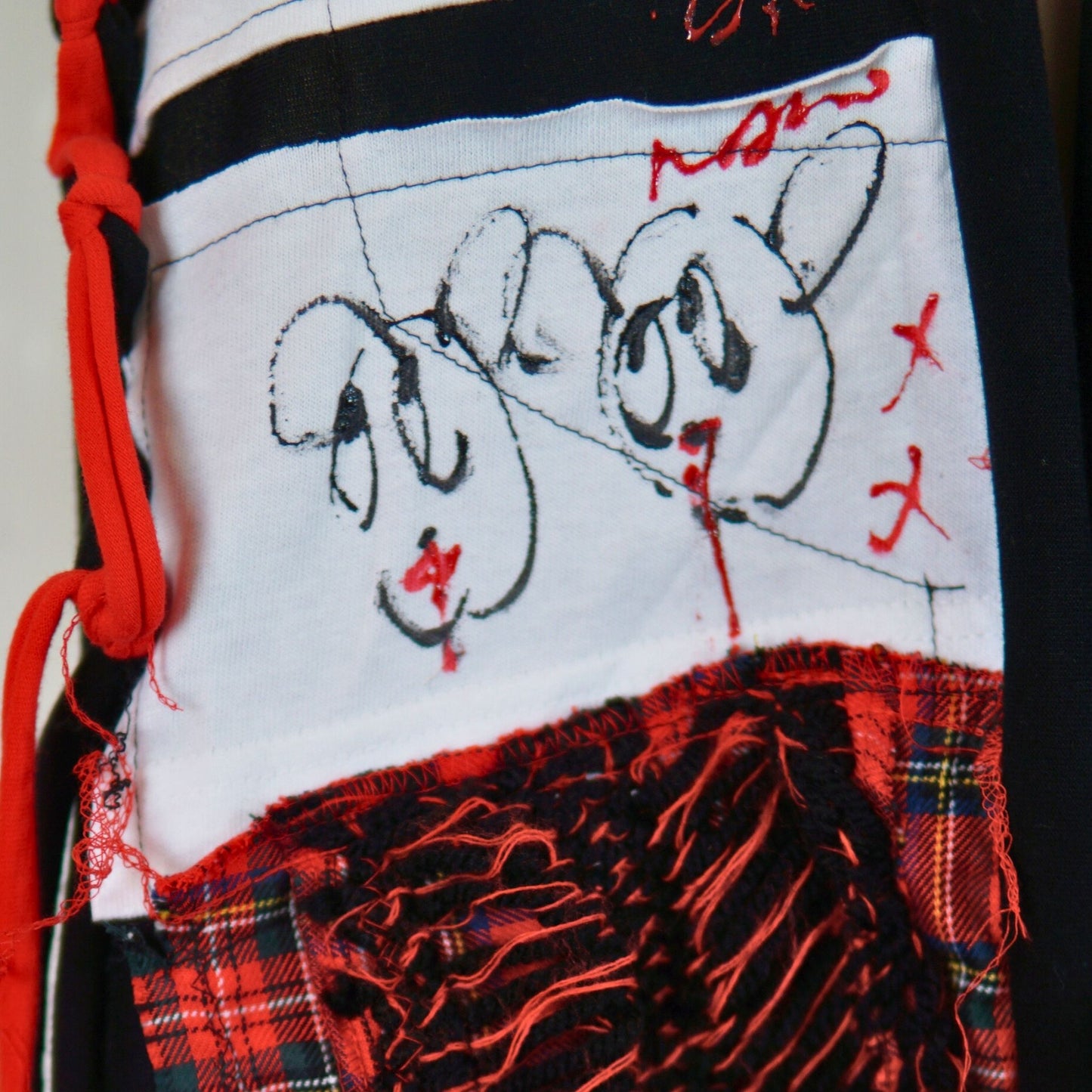 Face No.003 | Fabric Art  Red Tartan Design – Black Scarf